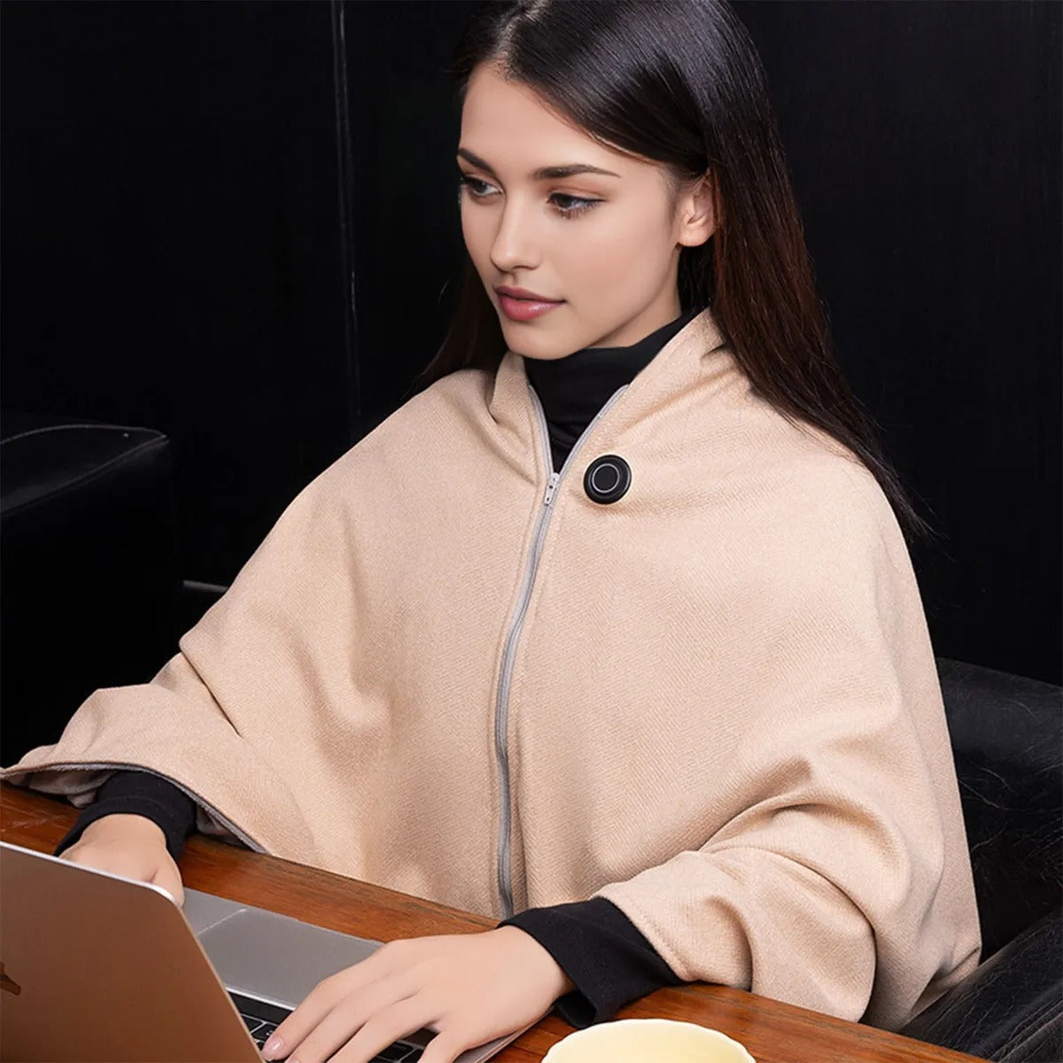MANTA PONCHO TÉRMICO USB — Tu calor instantáneo, portátil y sin cables engorrosos.