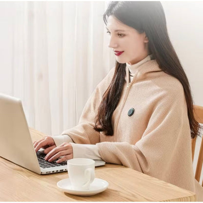 MANTA PONCHO TÉRMICO USB — Tu calor instantáneo, portátil y sin cables engorrosos.